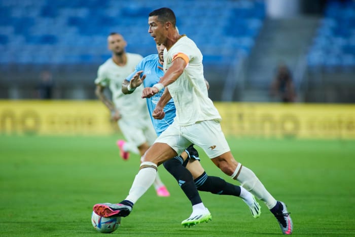 Cristiano Ronaldo pictured playing for Al Nassr in a pre-season game against Celta Vigo in July 2023